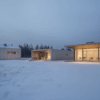 Modern Nordic architecture in Espoo Finland, clean lines, contemporary buildings, Finnish design aesthetic, winter landscape with snow, no people