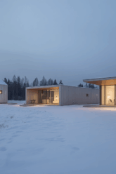 Modern Nordic architecture in Espoo Finland, clean lines, contemporary buildings, Finnish design aesthetic, winter landscape with snow, no people